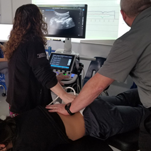 image New Roads chiropractic ultrasound imaging of spinal vertebrae during treatment